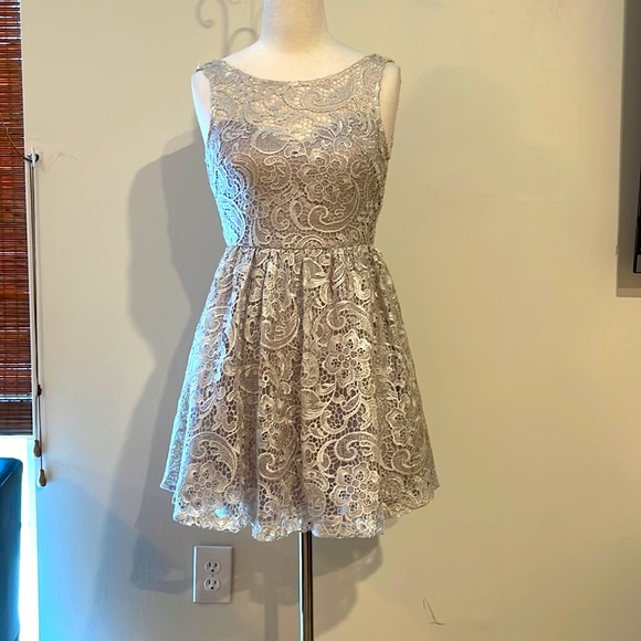 A gorgeous holiday mini dress!! - Picture 1 of 6
